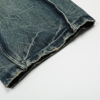 Irregular patchwork wavy line jeans 33
