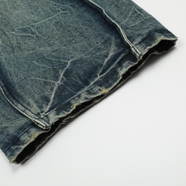 Irregular patchwork wavy line jeans 33
