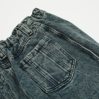 Irregular patchwork wavy line jeans 33