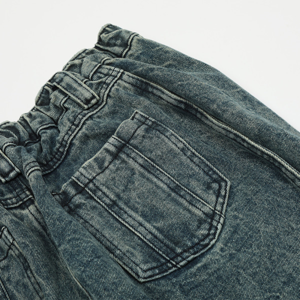 Irregular patchwork wavy line jeans 33